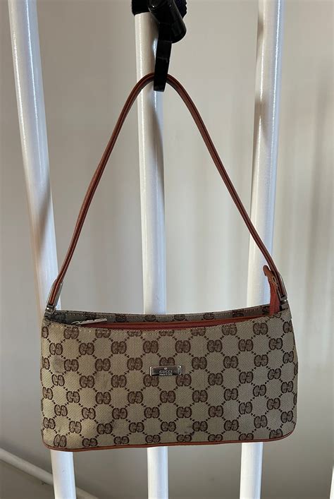 gucci pochette boat bag|real gucci pouch.